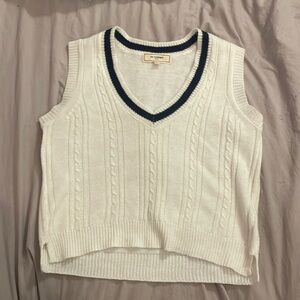 white and blue, no comment vest